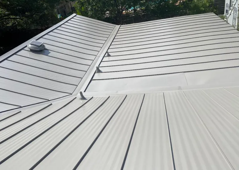 Solar attic fan installed on a metal roof for Roof Ventilation in St. Petersburg